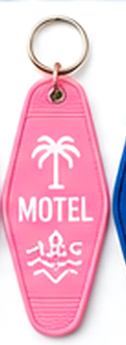 Pink motel key tag with a palm tree