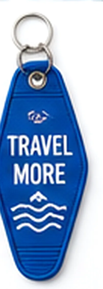 Blue hotel key tag reading Travel More