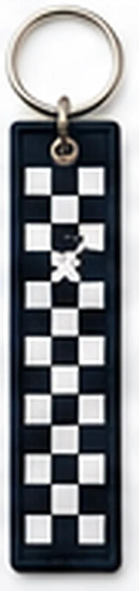 Woven key tag with a black and white checkerboard pattern