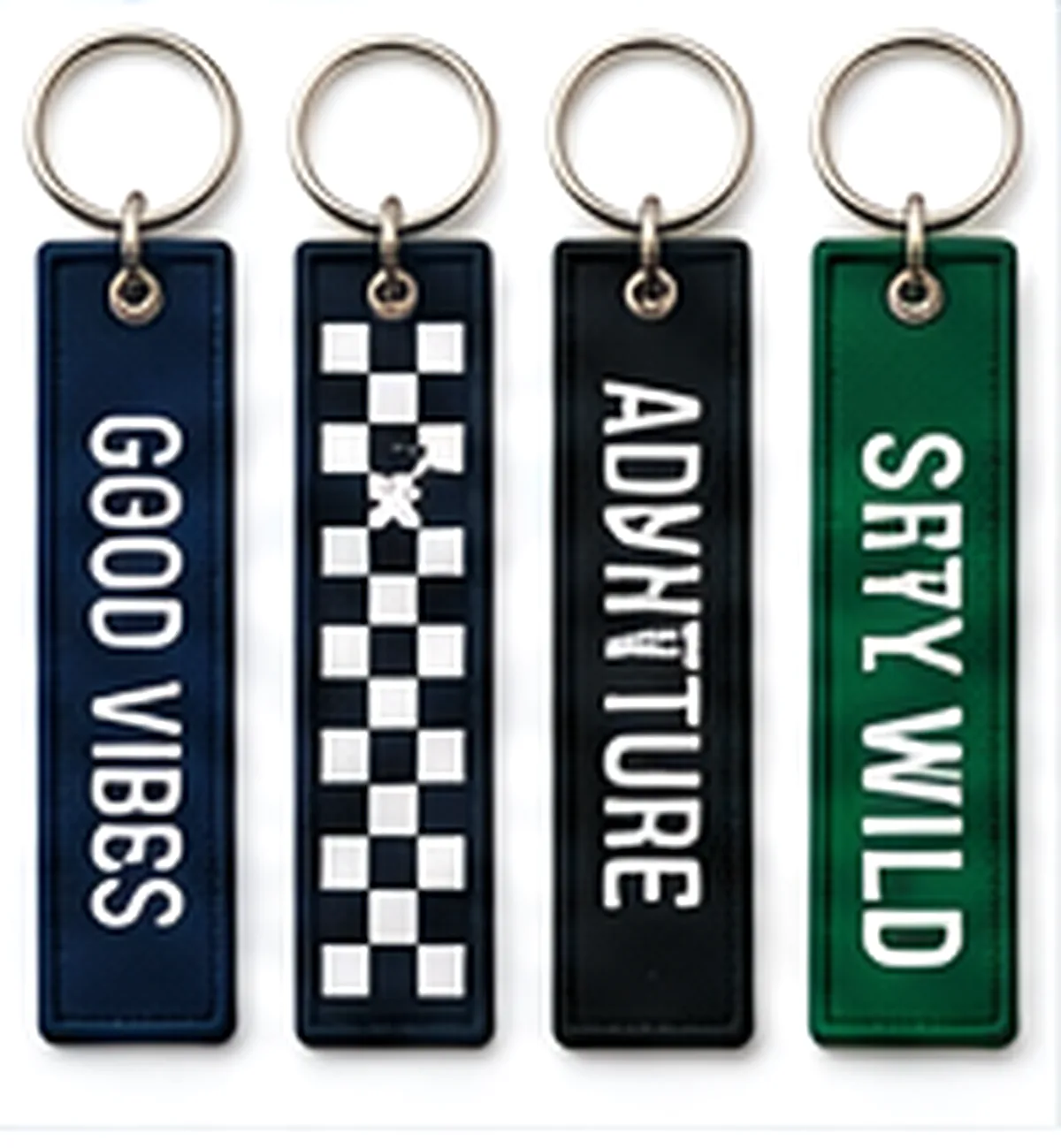 Four woven key tags in different designs and colours