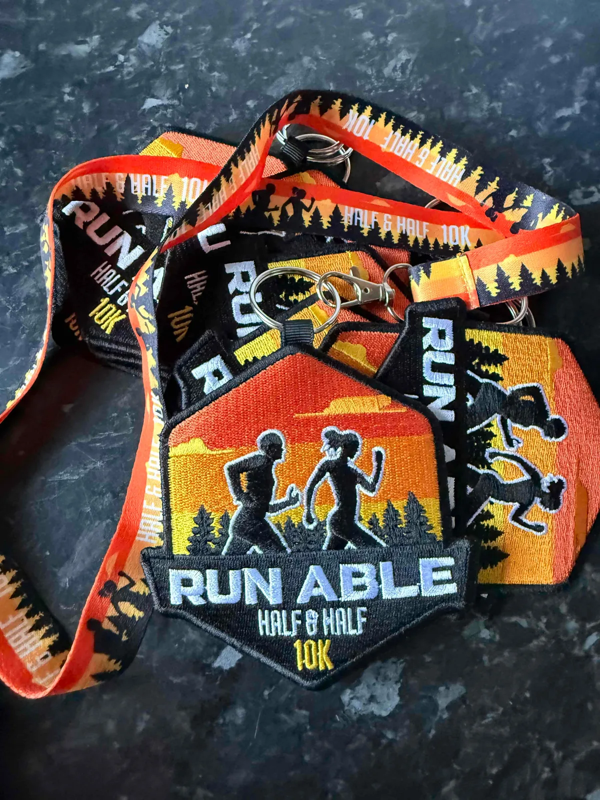 Embroidered race patch on printed lanyards