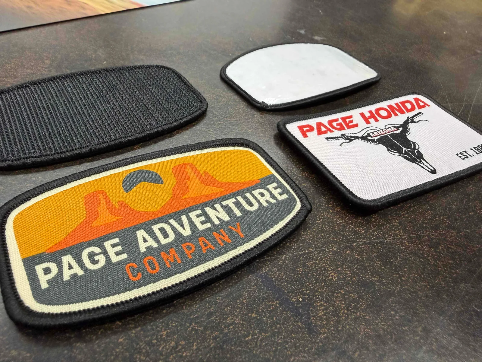 Patch samples laid out on a workbench